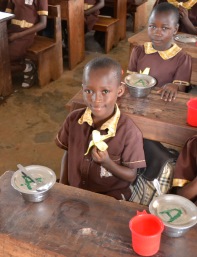 Boy eating lunch in Osun State Nigeria